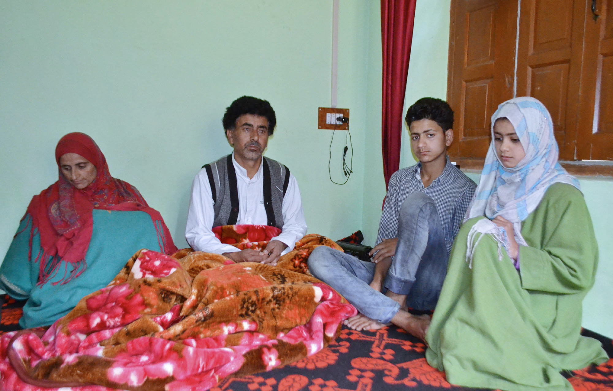 Making of a Martyr: Family members of Iqbal Farooq Peer. Iqbal was shot dead while he was closing the shutters of his shop at Handwara town. “He has brought honour to the entire family,” says Iqbal’s father Farooq Ahmad Peer