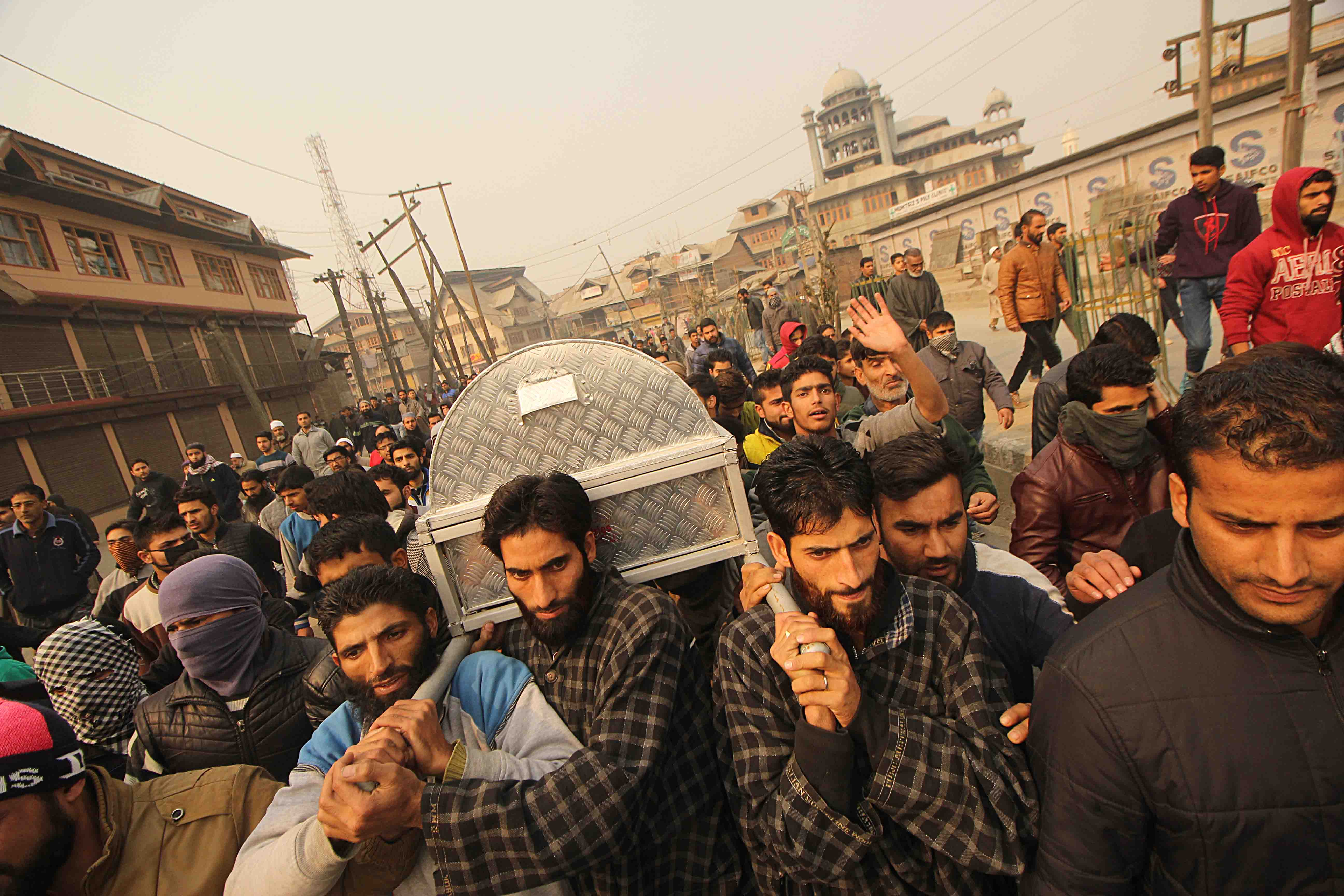 People carry the coffin of Noorbagh teenager. Photo: Faisal Khan